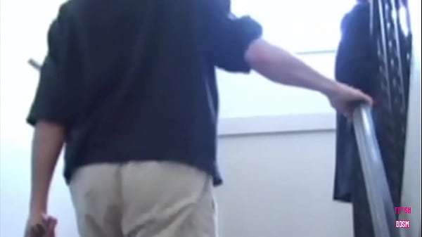 A guy brings a brunette home to humiliate him and fuck him with a strapon