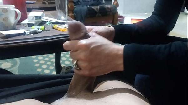 Arab wife jerking her husband