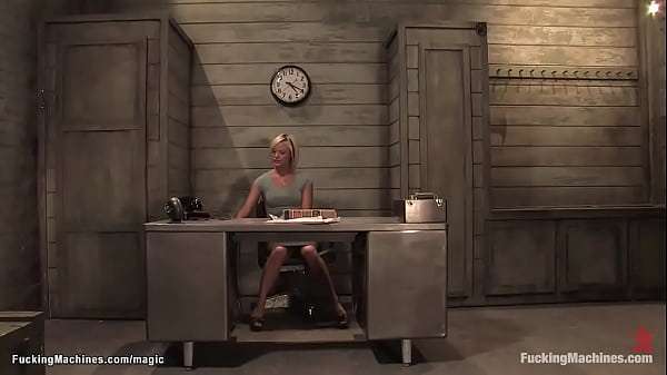 Blonde fucks machine in her office