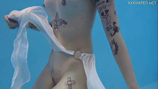 Cutest tattooed teen Mimi swimming naked