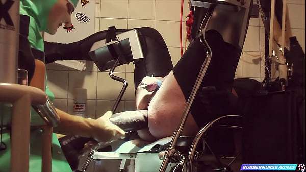 Rubbernurse Agnes – deep pegging with a huge BBC Dildo plus a handjob wearing long transparent gyn exam gloves plus balls squeezing  until cum
