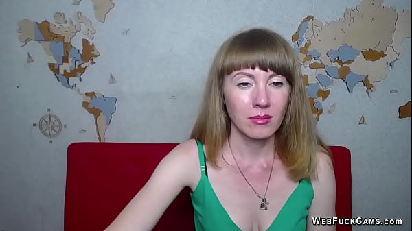 Amateur MILF covering small tits on webcam