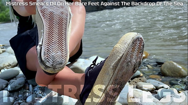 Goddess In Tan Nylons Show Her Cute Nylon Soles And Toes On The Riverside