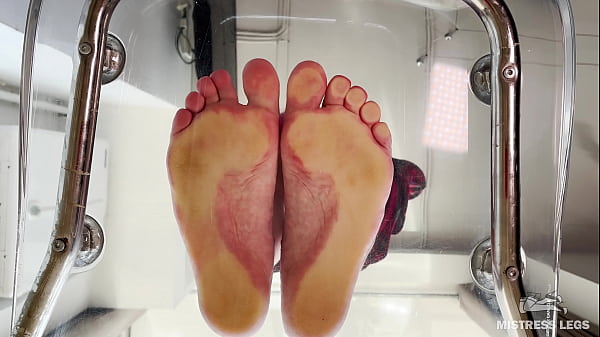 Squeezing juice from cherry tomatoes with my bare feet POV