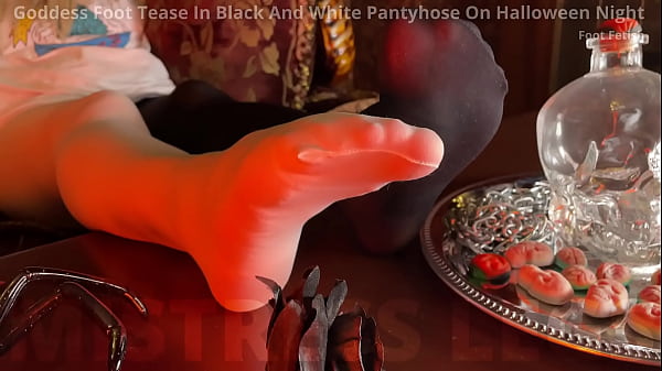 Goddess foot tease in black and white pantyhose